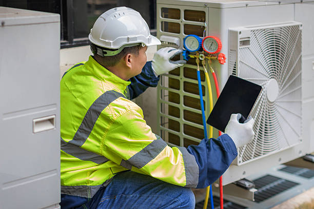 Professional Air Duct Cleaning technician working in Mc Lean, VA